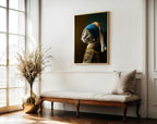 Pearl Earring Gray Cat framed above a chaise longue