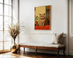 The Contented Ginger Cat framed above a chaise longue
