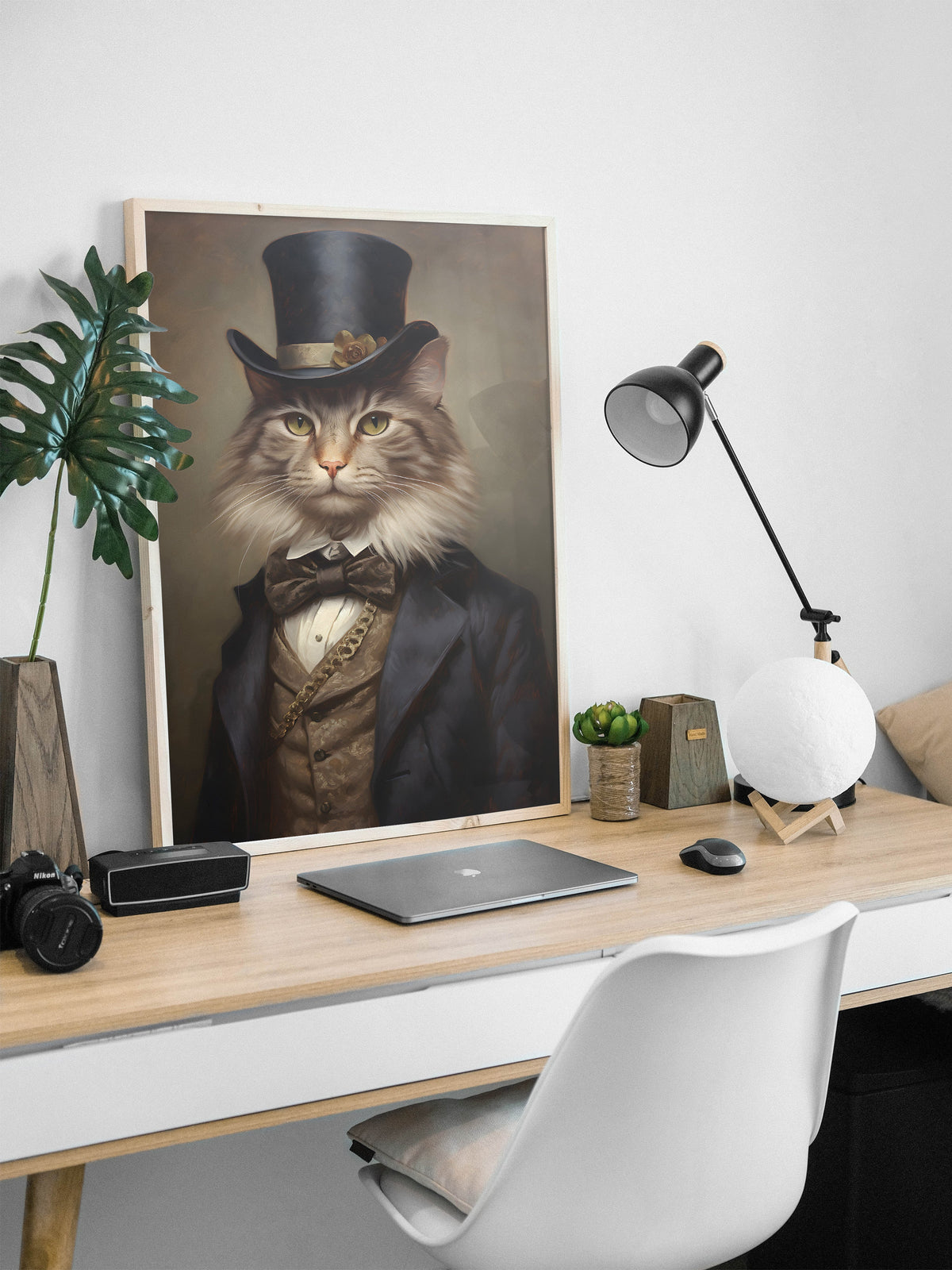 The Gentleman Cat framed above a desk