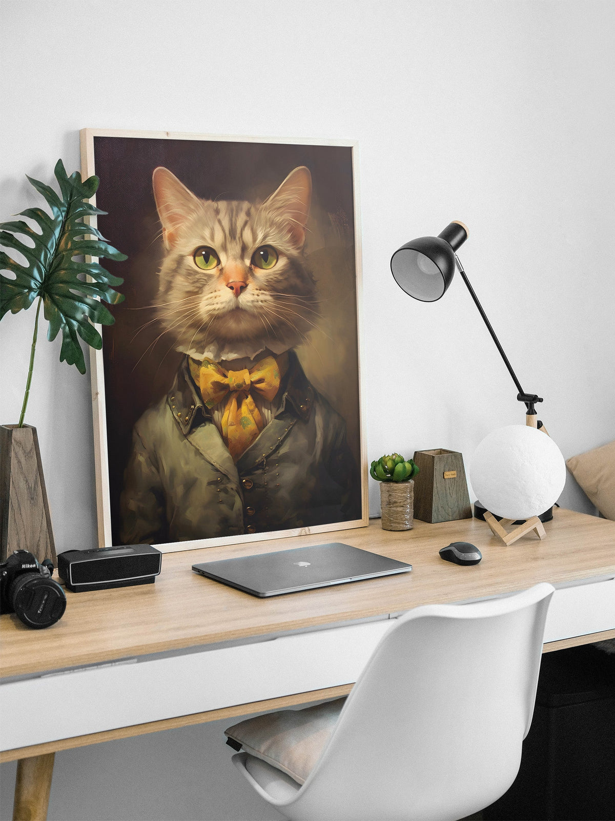 The Lady Cat framed above a desk