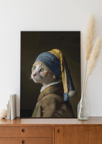 Pearl Earring Ginger Cat framed on the wall