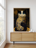 Golden Cat after Klimt framed above a sideboard